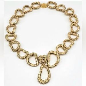 Atelier Swarovski Tigris necklace with champagne crystals in gold tone setting.